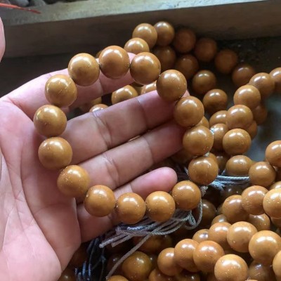精品实心紫金鼠菩提手串批发正圆光珠黄皮招财紫金鼠三眼菩 提佛珠图5